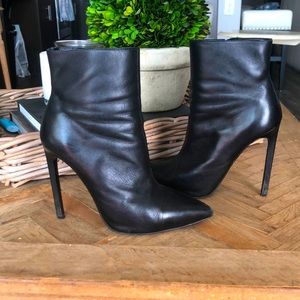 Tony Bianco black high heeled boots.